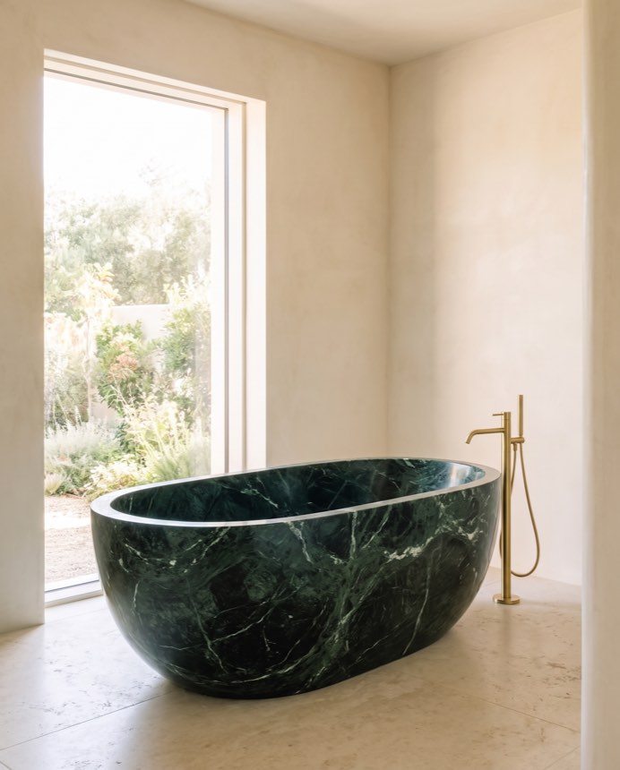 Verde stone bathing vessel in a wabi-sabi bathroom — Atelier Earthmade