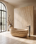 Tivoli stone bathing vessel in a wabi-sabi bathroom — Atelier Earthmade
