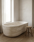 Sonoma California Beige Marble oval bathing vessel in a wabi-sabi bathroom