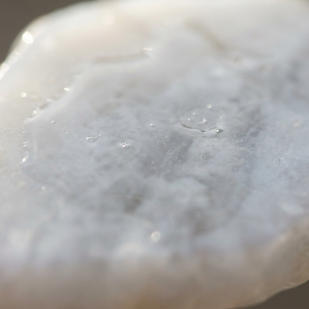 Han White Jade — polished stone detail, Atelier Earthmade